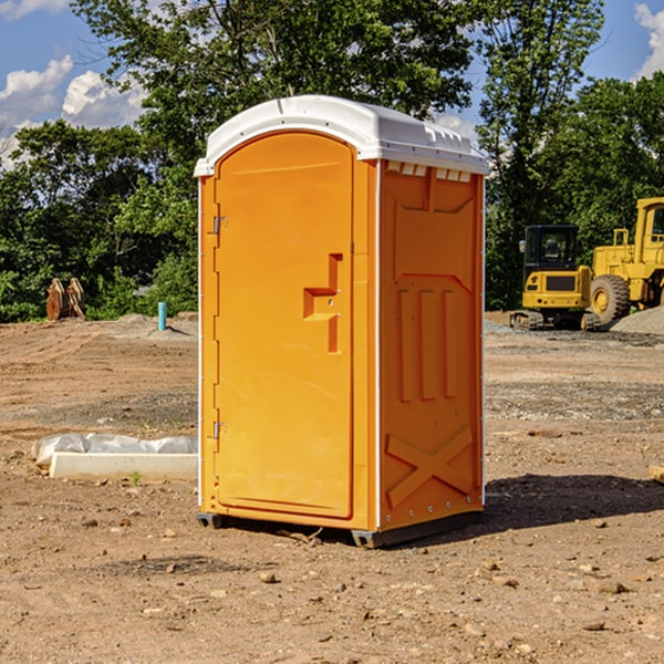 what is the cost difference between standard and deluxe portable toilet rentals in Akron